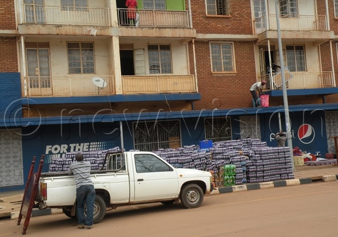 raders remove their merchandise from one of the properties hoto by ob amanya