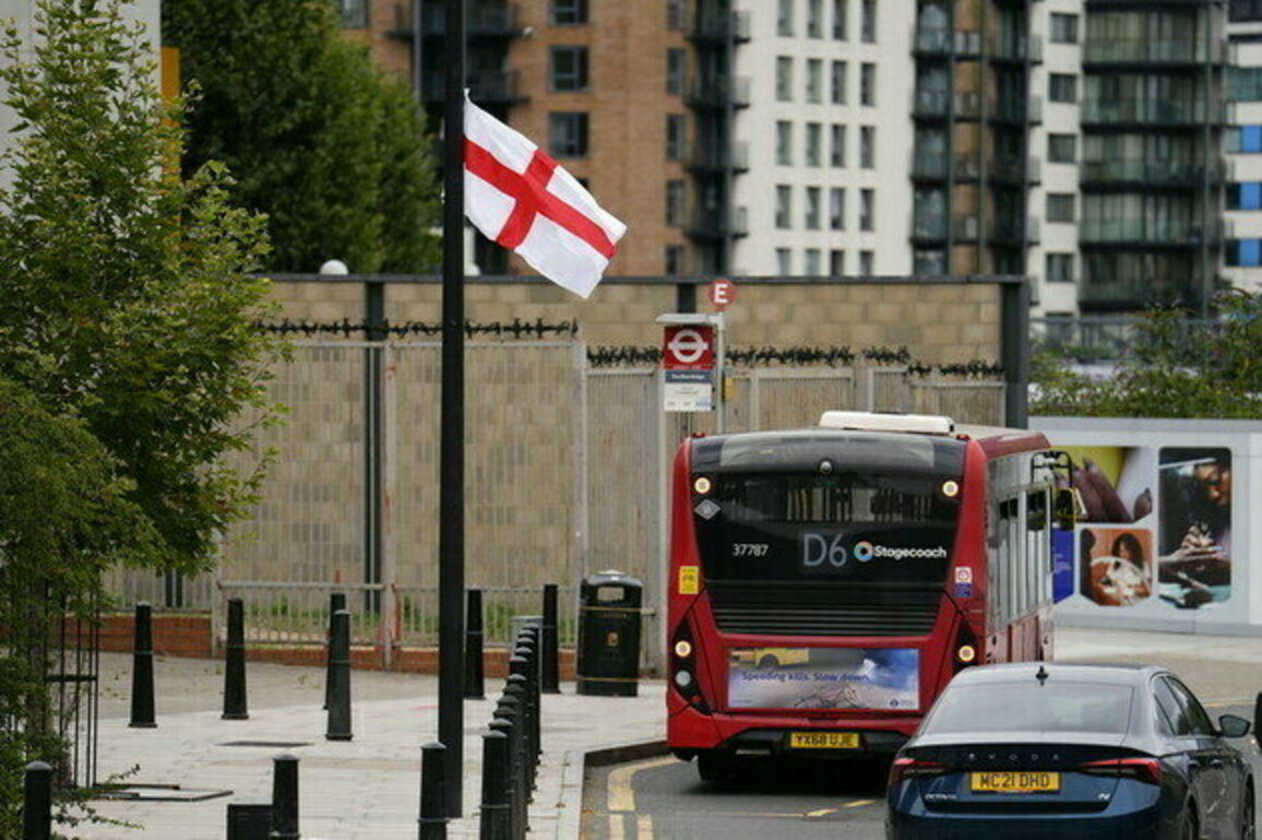 English flags hoisted across UK as tensions over migration rise 