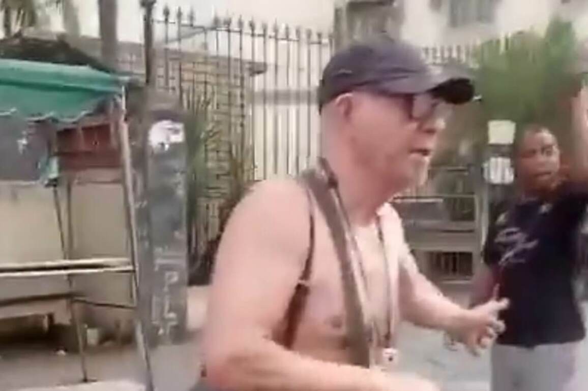 Gory moment man pushes his 100-year-old mother's corpse in wheelchair down the street