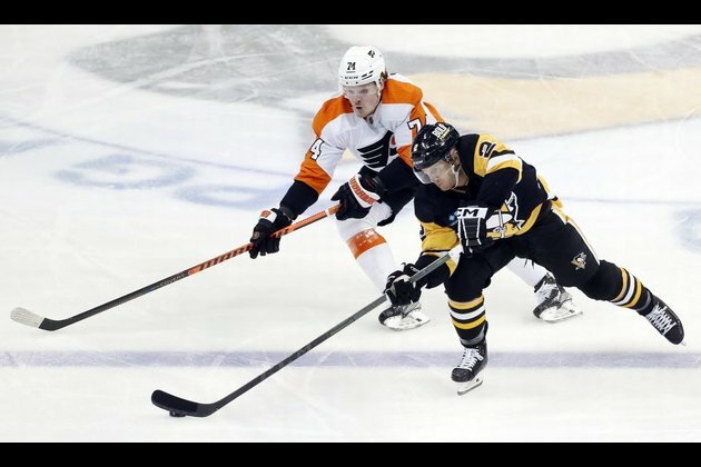 Penguins down Flyers, improve wild-card position