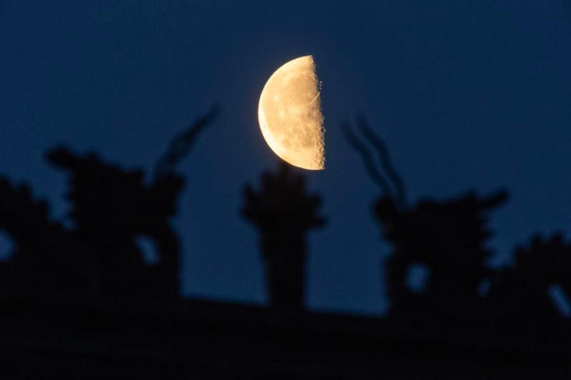 InPics | Smallest last quarter moon of 2026 observed in NE China's Heilongjiang