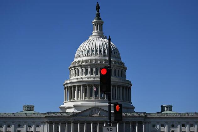 Feature: Americans already feeling the sting on day one of gov't shutdown