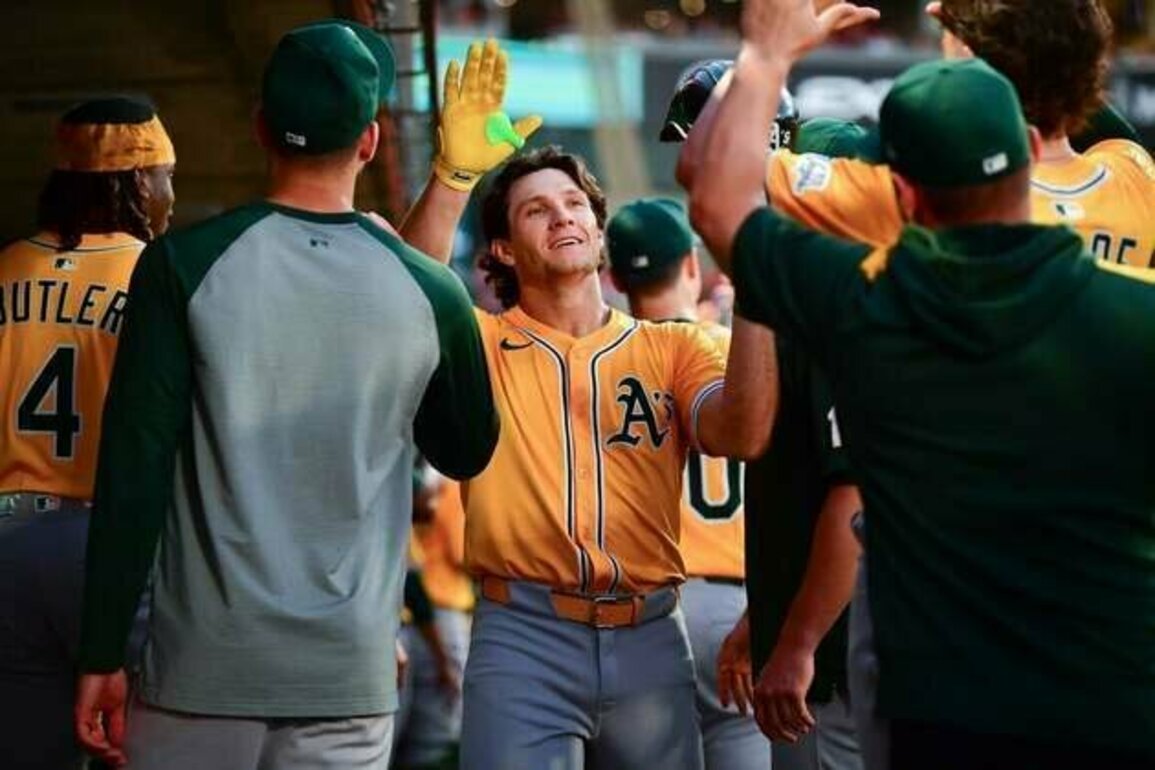 Athletics bash 4 HRs, 21 hits in blowout of Angels