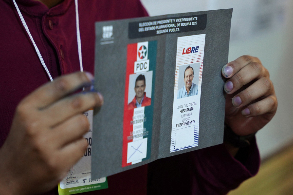 Polls open in Bolivia's presidential run-off as country faces deepening crisis