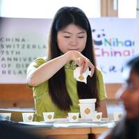 Chinese tea goes down a treat at Swiss mountaintop ceremony