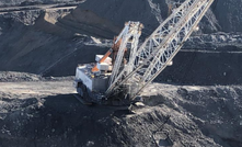  Dragline on a bench in a Queensland open cut mine bench that was constructed on unsuitable base material.