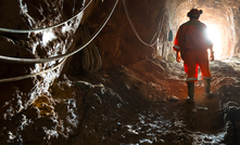  Miner inside the access tunnel of an underground gold and copper mine in Region del Maule, Chile