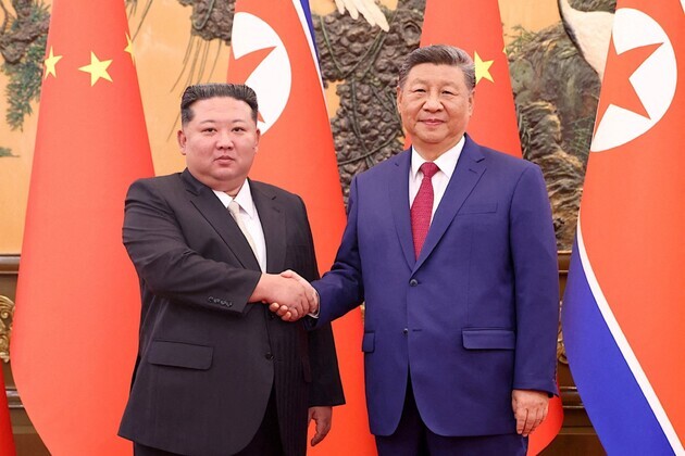 Ahead of Xi's visit, N Korean ruler Kim's sister says nuclear-armed state absolutely irreversible