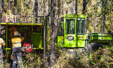 Drill operators at work with one of the JSW Drilling low-impact rigs.