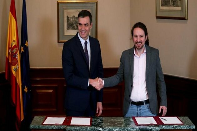 Spain's ruling Socialists sign coalition deal with Podemos