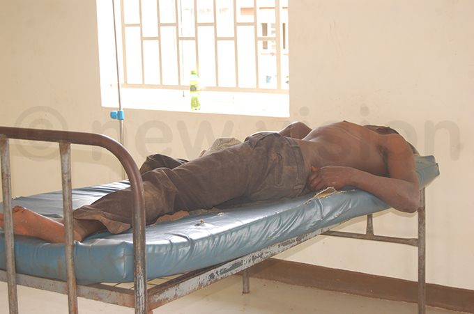  patient lying unattended to in the male ward hoto by dolf yoreka