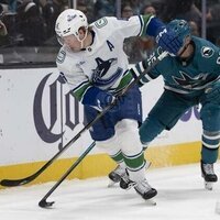 Canucks pull out win over Sharks in shootout