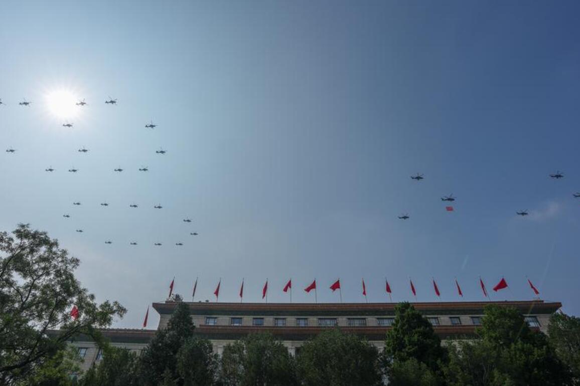 FOCUS | March-past of China's V-Day parade begins with flag-guarding echelon flying over Tian'anmen Square