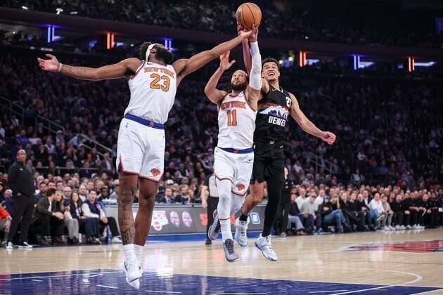 Knicks win eighth straight in double overtime clash with Nuggets