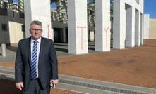  Resources minister Keith Pitt stands outside Parliament House, Canberra, following a protest by Extinction Rebellion.