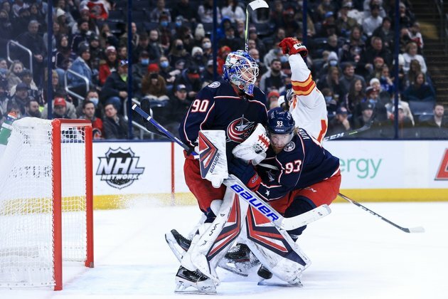 Flames pile up 62 shots in blowout of Blue Jackets
