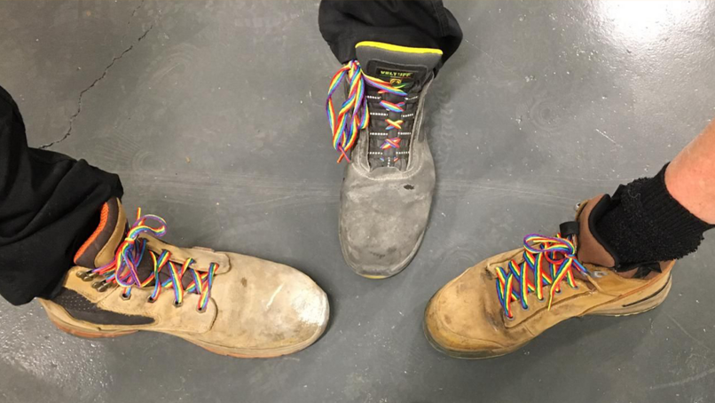 Travis Perkins employees wearing rainbow laces