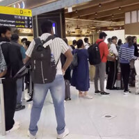 Passengers stranded at Abu Dhabi Airport following flight cancellations amid escalating tensions in Middle East