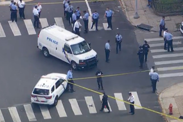 Philadelphia police officer in critical condition after shooting erupts outside high school