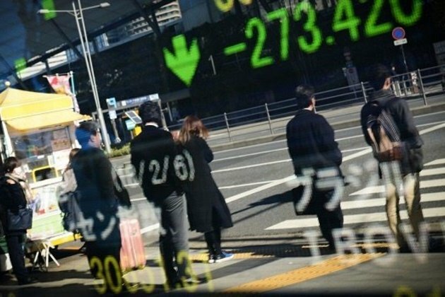 Stocks remain buoyant as US stimulus bill is passed