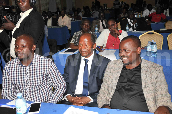inisters iwanda suubi  ohn  uyingo and yeyune asolo during the uganda caucus election process at ider otel on riday