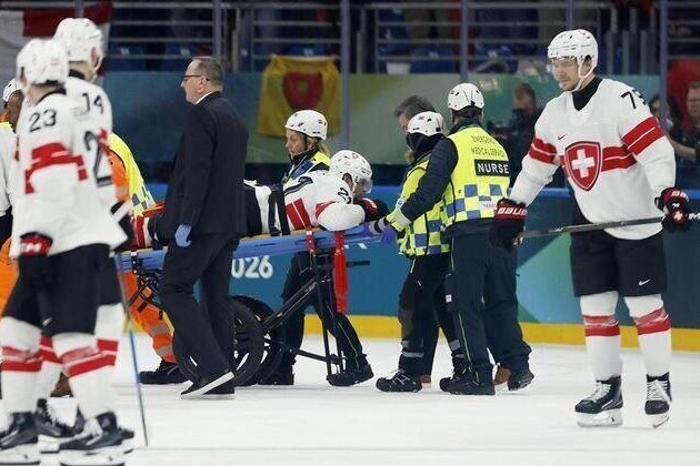 Swiss F Kevin Fiala (leg) stretchered off vs. Canada