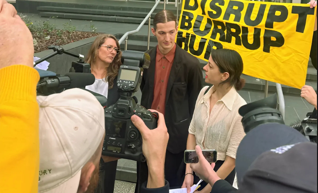 Woodside protestors outside of court