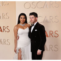 Oscars 2026: Priyanka Chopra stuns in white Dior gown, walks red carpet hand-in-hand with husband Nick Jonas