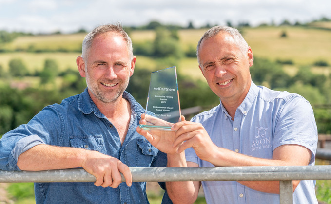Jamie Feilden with his VetPartners award and farm vet Dewi Jones.