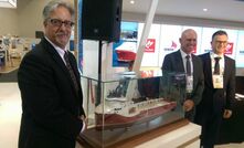 Woodside COO Mike Utsler, WA's then-petroleum minister Sean L'Estrange and Siem Offshore CEO Idar Hillersoy at LNG18 with the PSV model.