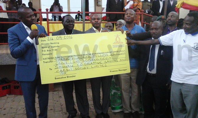 Gov't loans Sheema SACCOs 550m to fight poverty Gov't loans Sheema SACCOs 550m to fight poverty