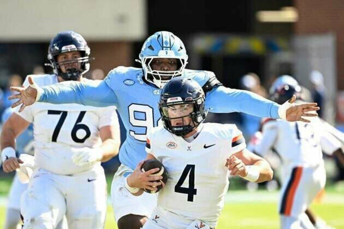 No. 16 Virginia edges struggling North Carolina in OT