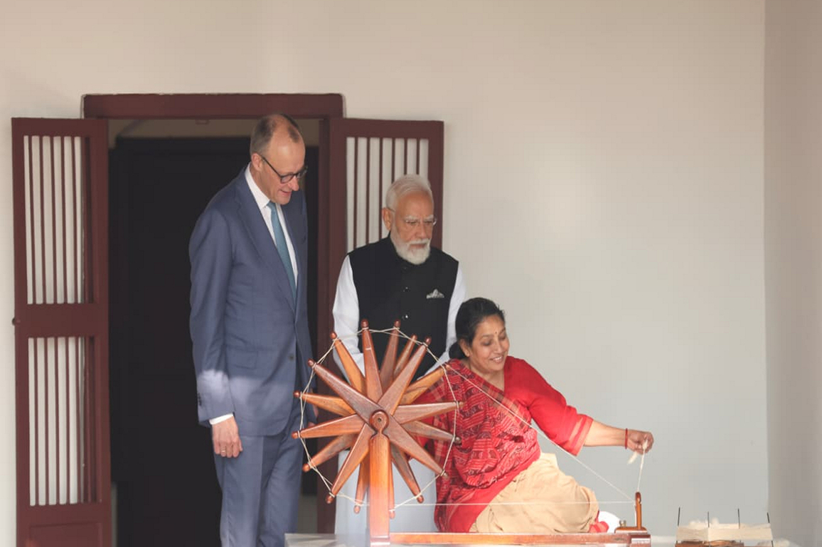 PM Modi, German Chancellor Merz observe charkha spinning at Sabarmati Gandhi Ashram
