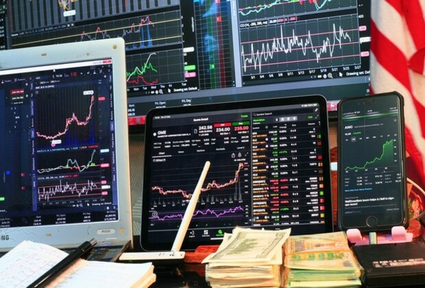 Stock markets end flat amid uncertainties over US tariffs, volatility expected to continue, say experts