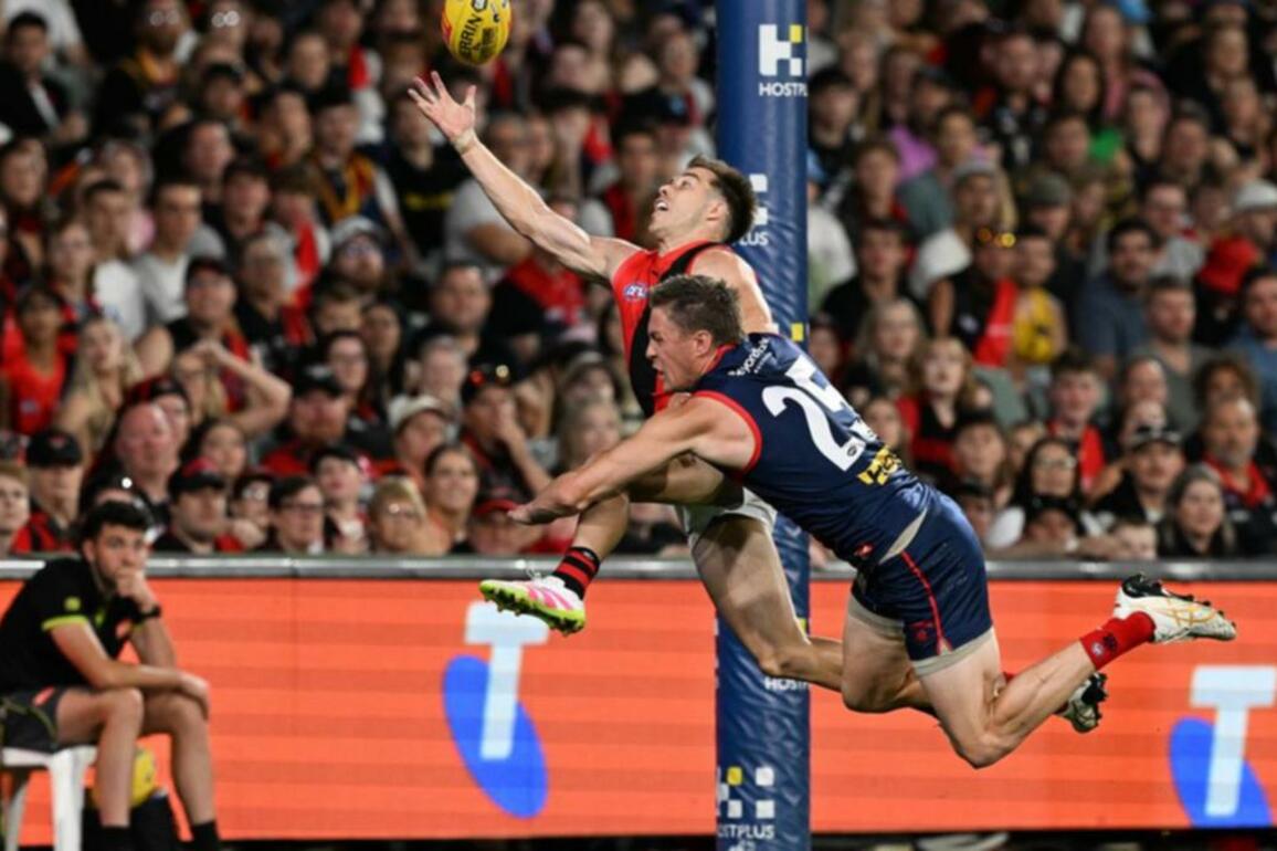 Essendon salute as winless Melbourne sink into the mire