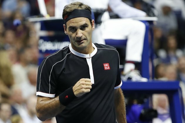 Federer saves 7 match points, reaches Australian Open semis