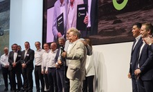 Andrew Forrest and Willi Liebherr celebrate their new chapter. Fortescue CEO Dino Obranto is on the right. Photo: Beth McLoughlin