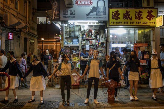 Thousands Protest Anti-Mask Law With Human Chain Across Hong Kong