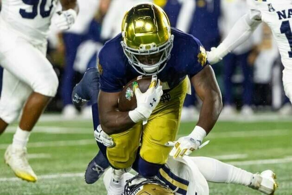 No. 10 Notre Dame makes easy work of Navy in the rain