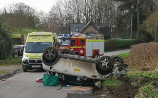 Farmers help overturned Mini Cooper driver after incident in Oxfordshire