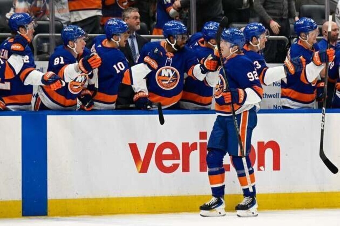 Simon Holmstrom (2 goals), Isles edge sinking Flames