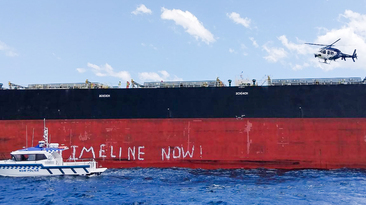 Police arrive to arrest the protesters.