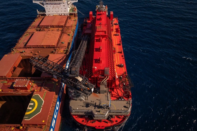 A MinRes transshipper loading Onslow ore.