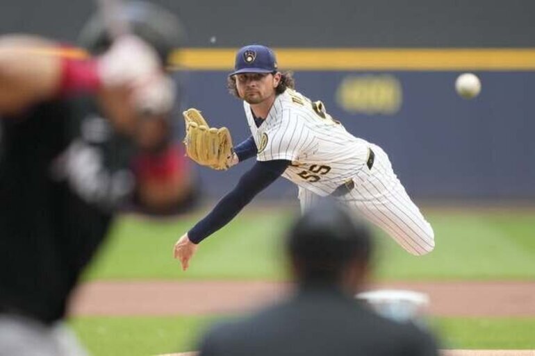 Shane Drohan takes ball for Brewers against visiting Rockies