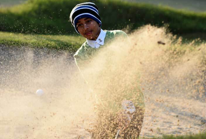  o go with ndiagolfjunior by bhaya   ndias o 1 junior golfer and junior world golf championship winner hubham aglan 11 hits a bunker shot at the elhi olf lub in ew elhi on ecember 15 2015 n 11yearold hubham aglans poor ndian village surrounded by sugarcane fields few had ever heard of golf until recently let alone know someone playing the sport internationally ut aglan has stunned his family and village since picking up a club at the age of just five winning backtoback junior titles in the  in 2015 and finishing sixth in an international event there for youngsters          