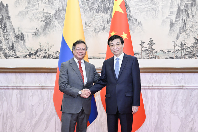 CHINA-BEIJING-WANG HUNING-COLOMBIAN PRESIDENT-MEETING (CN)