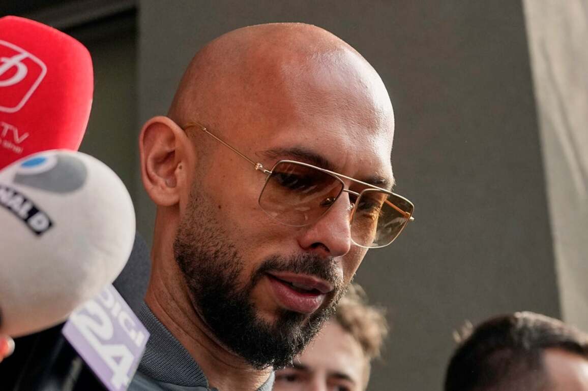 Woman Suing Andrew Tate Accuses Him Of Pointing Gun At Her Face  Latest News