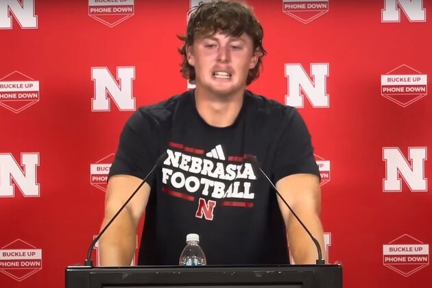 College football star breaks down during press conference