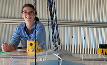 DPIRD research scientist Brittany Bolt looks over the Portable Accumulation Chambers at the Katanning Research Station in WA, used to measure methane production from sheep.