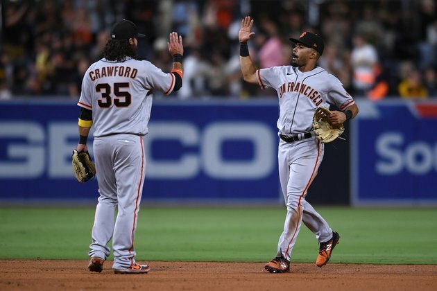 MLB roundup: Giants slip by Padres to keep NL West lead